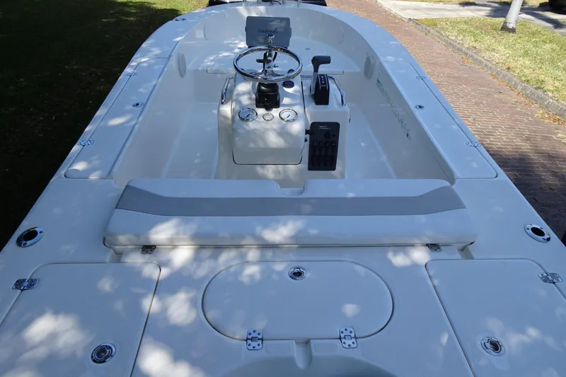 Slide: The Image of 2015 Pioneer 186 Cape Island boat interior with steering console and seating. - 9