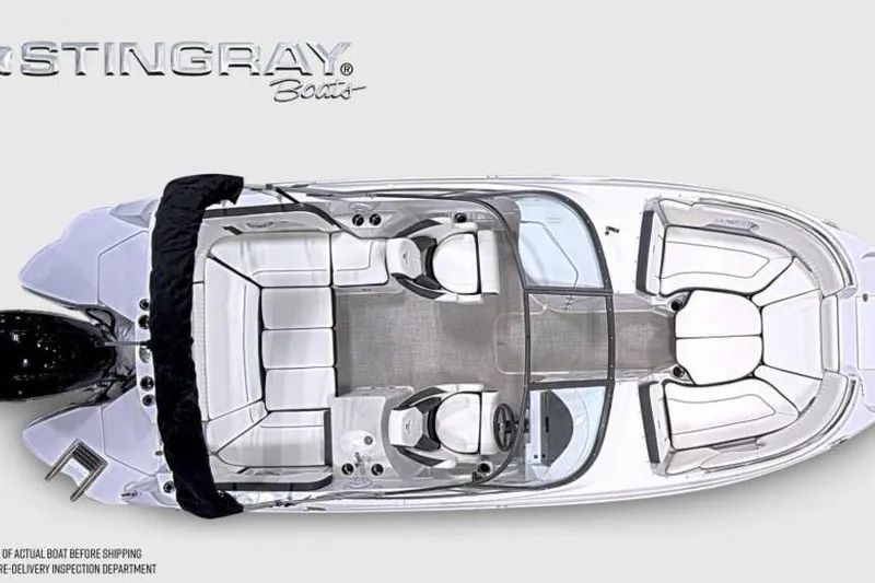 Slide: The Image of Top view of 2026 Stingray 231 DC boat with spacious seating layout. - 7