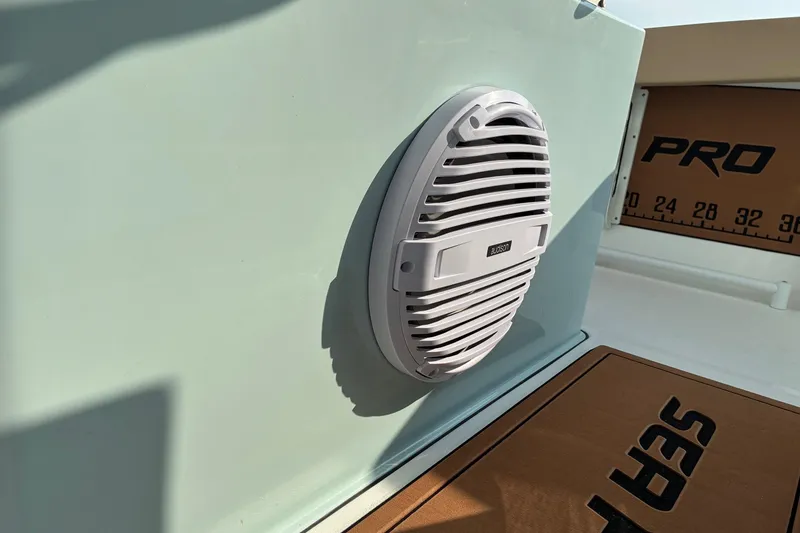 Slide: The Image of Speaker on 2026 Sea Pro 245FLX Sandbar boat, featuring sleek design and branding. - 16