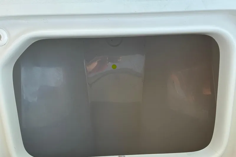 Slide: The Image of Interior view of 2026 Sea Pro 245FLX Sandbar boat compartment. - 33