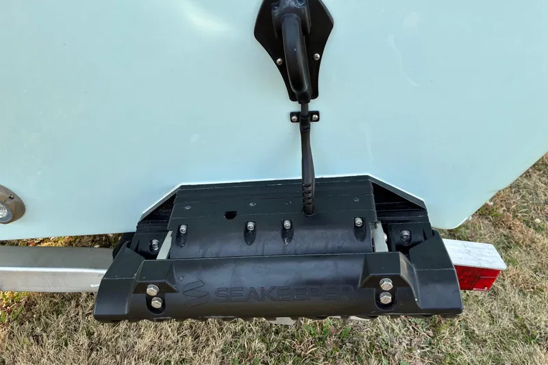 Slide: The Image of 2026 Sea Pro 245FLX Sandbar boat with Seakeeper stabilizer on trailer. - 6