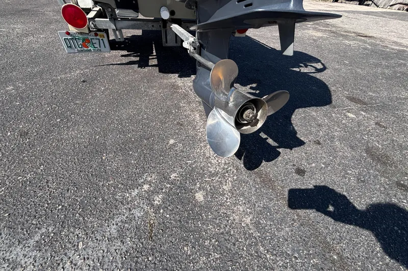 Slide: The Image of 2017 GHEENUE Super 16 boat propeller on asphalt, rear view. - 14