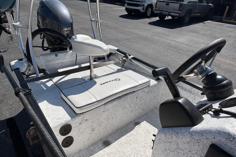 Slide: The Image of 2017 GHEENUE Super 16 boat interior with steering wheel and Yamaha 40 engine. - 6