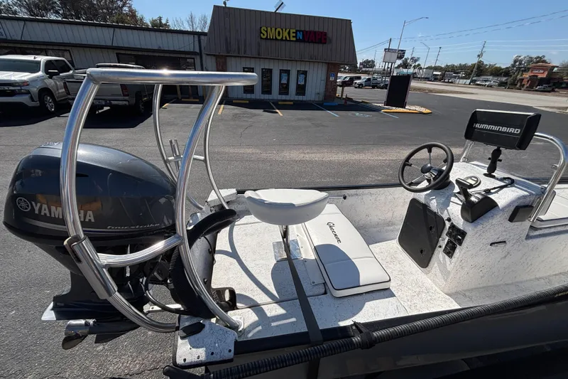 Slide: The Image of 2017 GHEENUE Super 16 boat with Yamaha motor, parked near a store. - 7