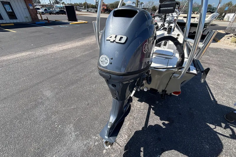 Slide: The Image of 2017 GHEENUE Super 16 boat with Yamaha 40 HP outboard motor in parking lot. - 8