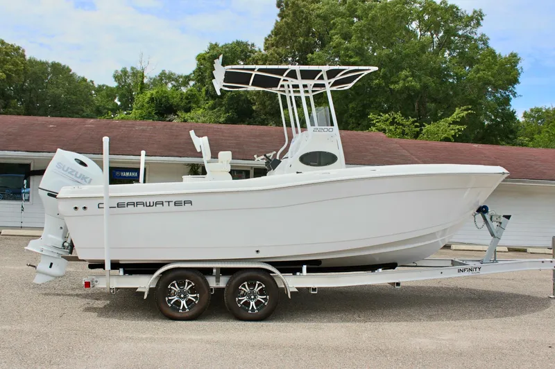 The Image of 2024 Clear Water 2200 CC boat on trailer, side view, outdoors. - 1