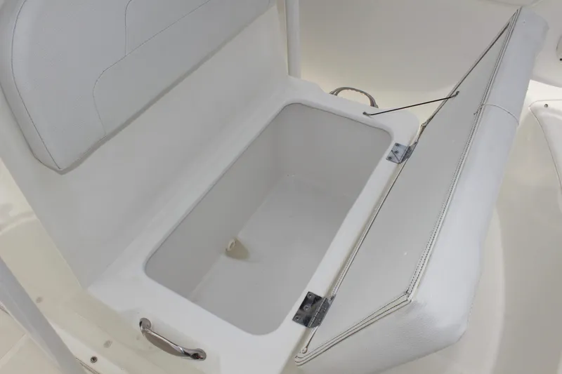 Slide: The Image of Open storage compartment in 2024 Clear Water 2200 CC boat interior. - 15