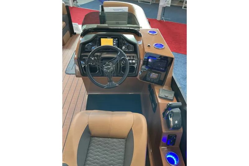Slide: The Image of 2026 Bentley Pontoons Elite 253 Admiral helm with advanced controls and luxurious seating. - 4