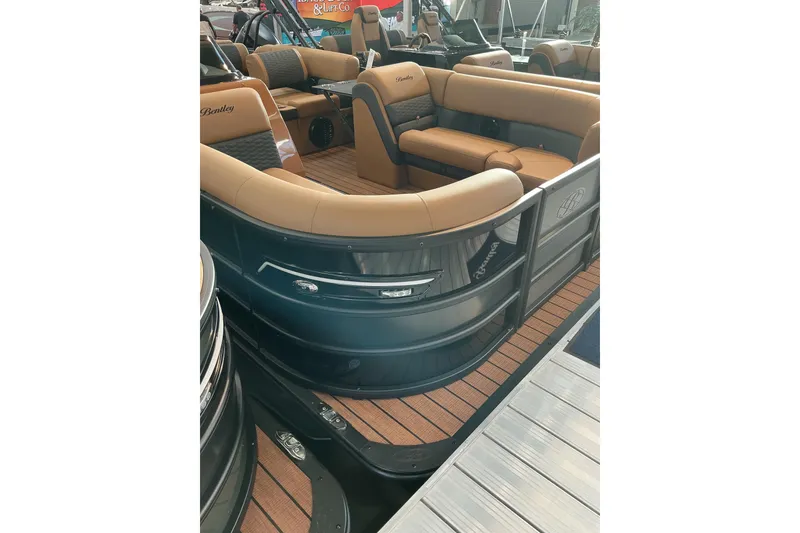 Slide: The Image of 2026 Bentley Pontoons Elite 223 Swingback Bench with luxurious seating and sleek design. - 2