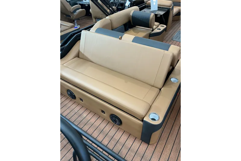 Slide: The Image of 2026 Bentley Pontoons Elite 223 Swingback Bench with tan upholstery and cup holders. - 5