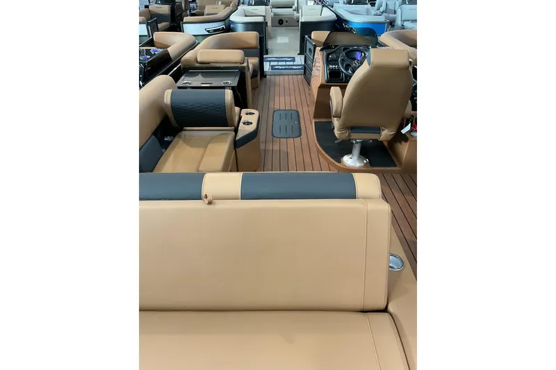 Slide: The Image of 2026 Bentley Pontoons Elite 223 interior with luxurious seating and modern helm design. - 8
