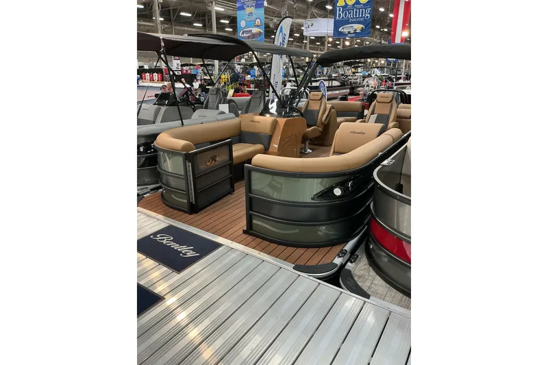 The Image of 2026 Bentley Pontoons Legacy 223 Navigator 3/4 Tube at a boat show display. - 0