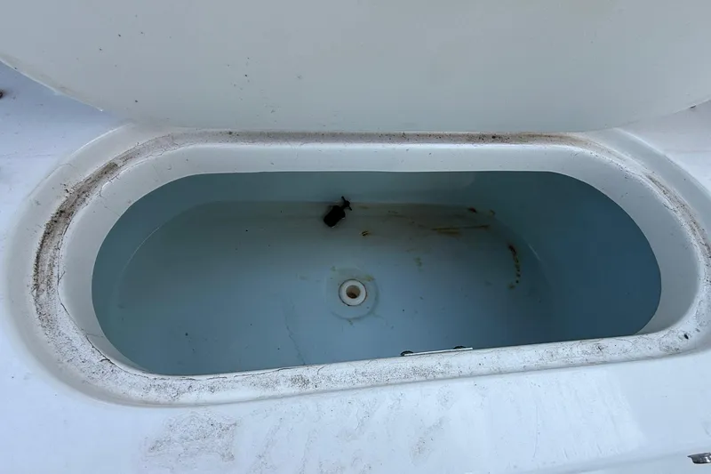 Slide: The Image of Open livewell on 2017 Key West 189 FS boat, partially filled with water. - 20