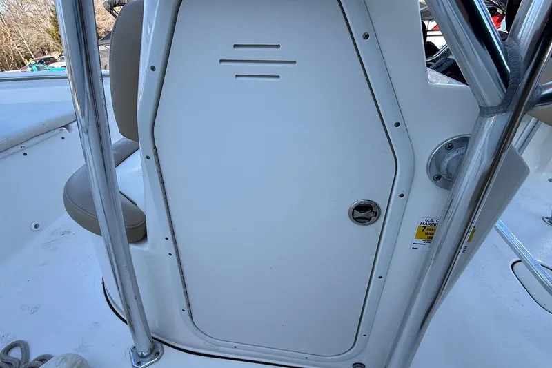 Slide: The Image of 2017 Key West 189 FS boat console with storage compartment and seating. - 22