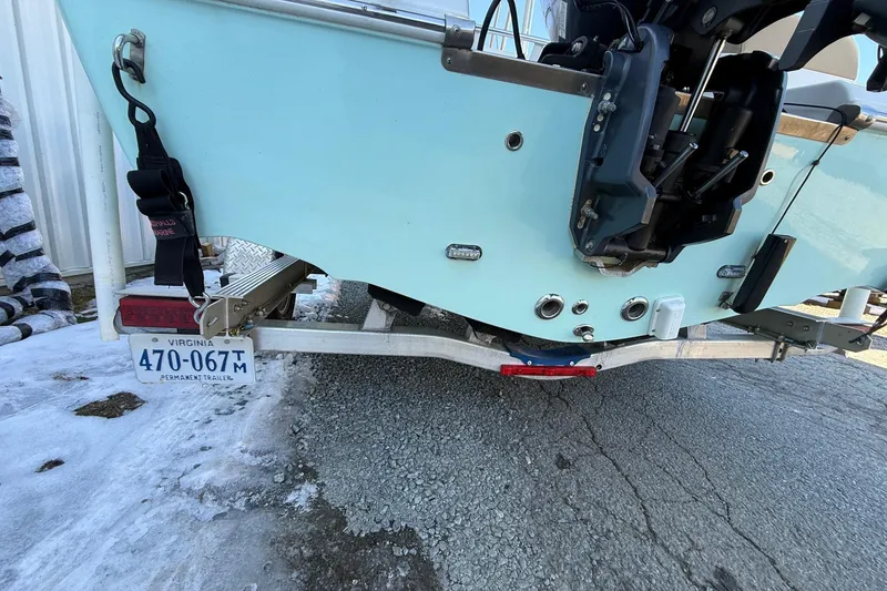 Slide: The Image of Rear view of 2017 Key West 189 FS boat on trailer, Virginia license plate visible. - 34