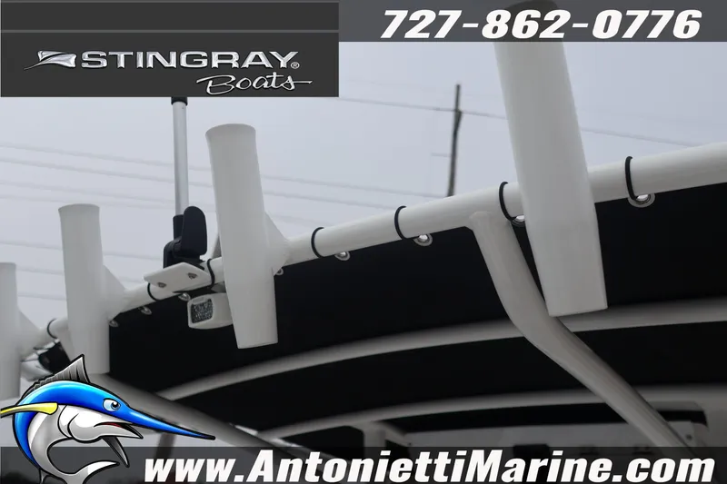 Slide: The Image of 2026 Stingray 236 CC boat with rod holders, Antonietti Marine branding. - 18