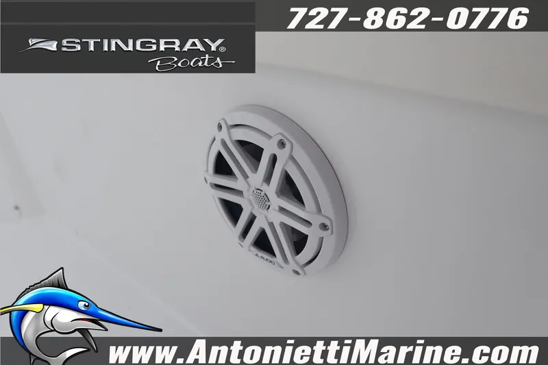 Slide: The Image of 2026 Stingray 236 CC boat speaker detail with contact information and logo. - 20