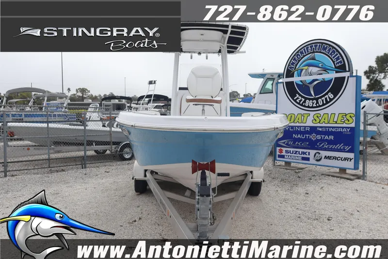 Slide: The Image of Stingray 236 CC 2026 boat at Antonietti Marine sales lot, contact 727-862-0776. - 3