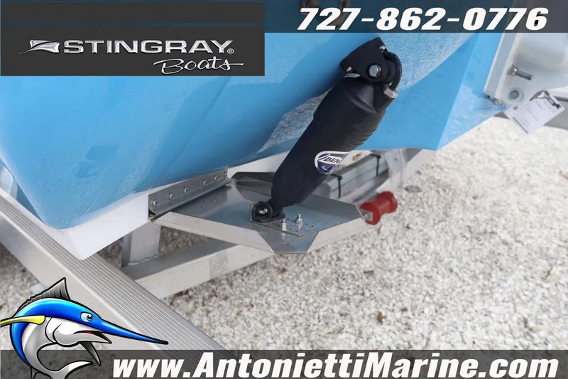 Slide: The Image of 2026 Stingray 236 CC boat detail with logo and contact information. - 8
