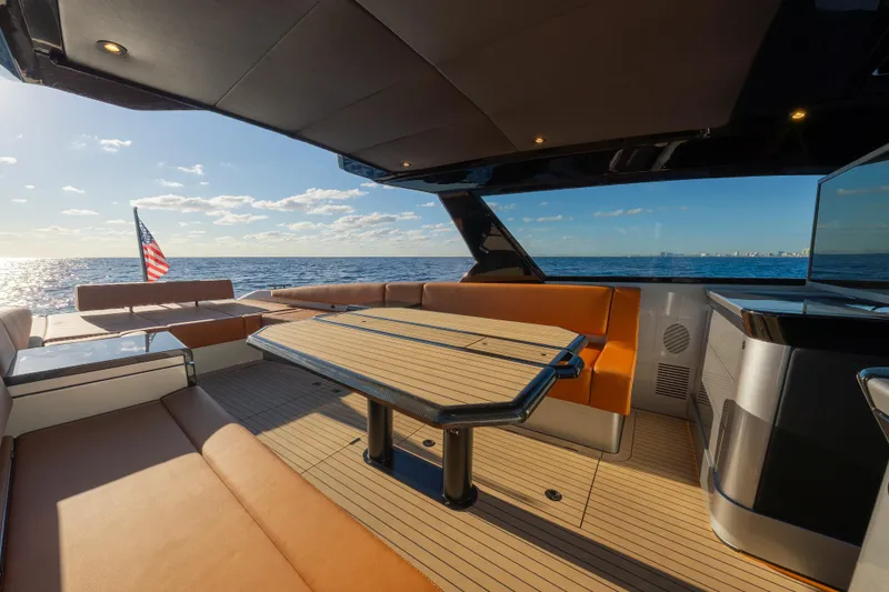 Slide: The Image of Luxurious 2024 Wajer 55 HT yacht interior with ocean view and elegant seating. - 11