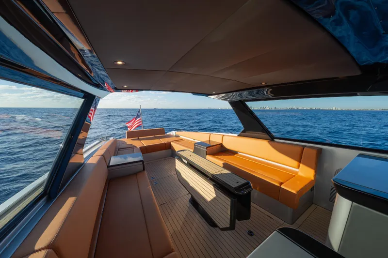 Slide: The Image of Luxurious 2024 Wajer 55 HT yacht interior with sleek seating and ocean view. - 26