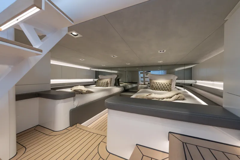 Slide: The Image of Luxurious interior of 2024 Wajer 55 HT yacht with modern twin beds and elegant lighting. - 32