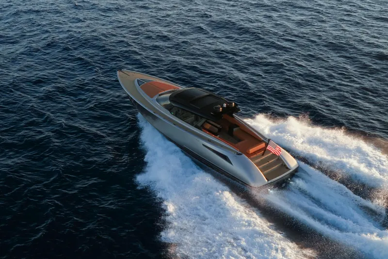 Slide: The Image of 2024 Wajer 55 HT luxury yacht cruising on open water, aerial view. - 48