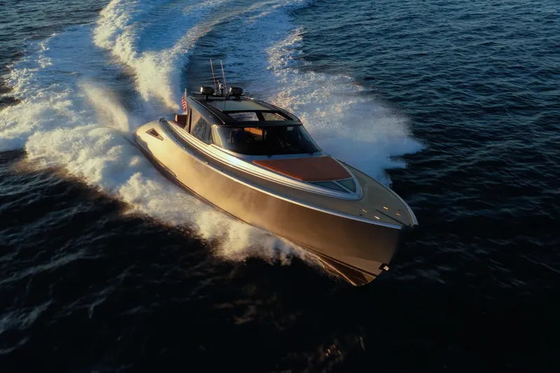 Slide: The Image of 2024 Wajer 55 HT luxury yacht cruising on open water at sunset. - 49