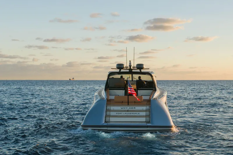 Slide: The Image of 2024 Wajer 55 HT yacht cruising at sunset with American flag. - 5