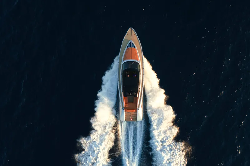 Slide: The Image of Aerial view of 2024 Wajer 55 HT yacht cruising on open water. - 55