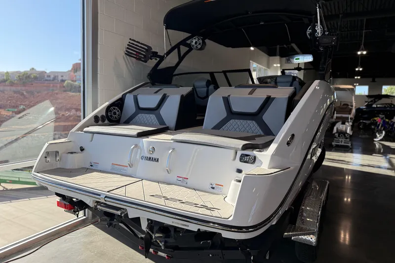 Slide: The Image of 2026 Yamaha Boats 222XD in showroom, showcasing sleek design and modern features. - 24