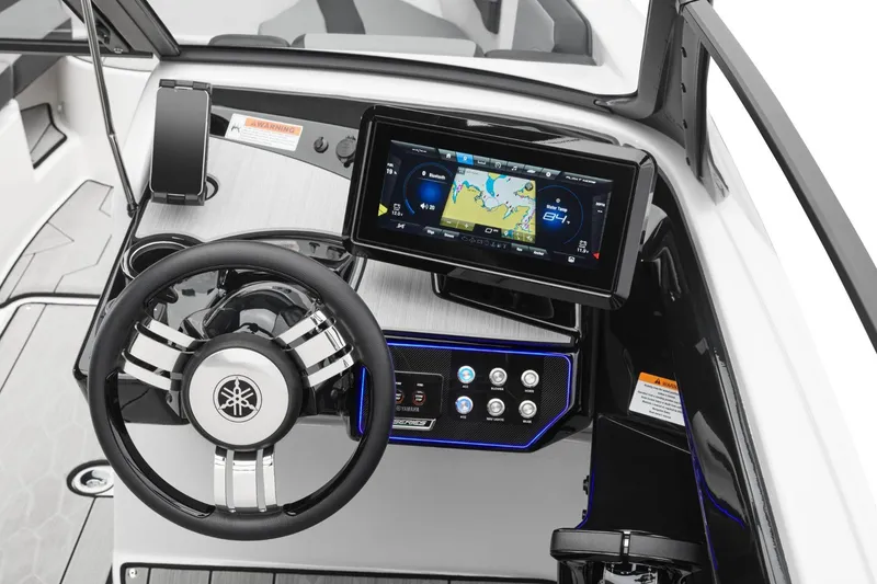 Slide: The Image of 2026 Yamaha Boats 222XD dashboard with touchscreen navigation and modern steering wheel. - 7