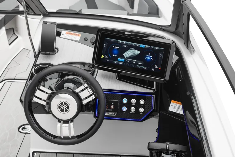 Slide: The Image of Steering console of 2026 Yamaha Boats 222XD with touchscreen display and controls. - 8