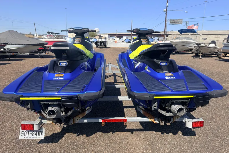 Slide: The Image of Two 2019 Yamaha WaveRunner EXR jet skis on a trailer in a parking lot. - 19