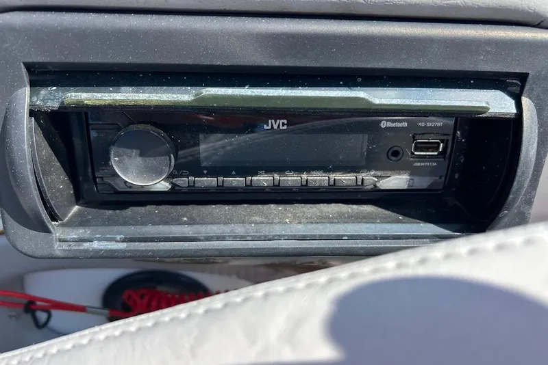 Slide: The Image of JVC Bluetooth stereo in 2001 Correct Craft Air Nautique boat dashboard. - 17