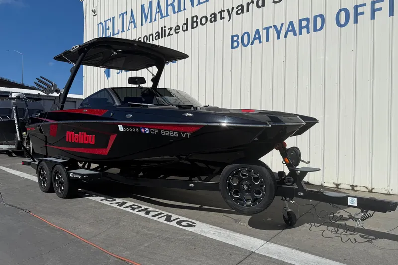 Slide: The Image of 2021 Malibu Wakesetter 23 MXZ boat on trailer at Delta Marine. - 1