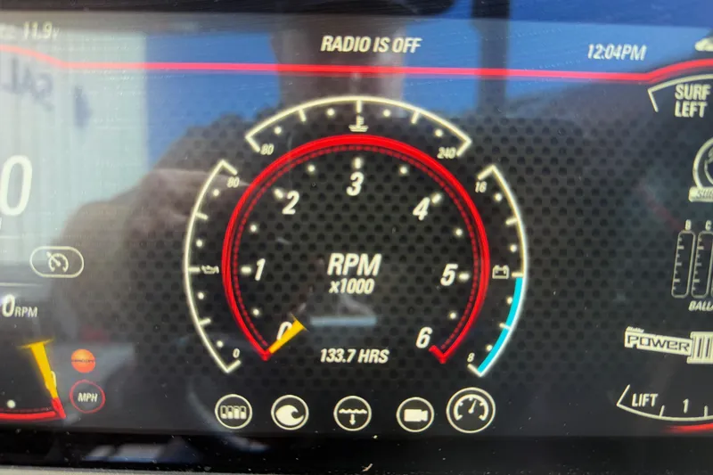 Slide: The Image of Dashboard of 2021 Malibu Wakesetter 23 MXZ showing RPM and engine hours. - 17