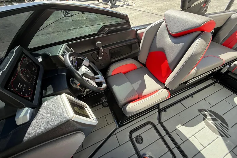 Slide: The Image of Interior of 2021 Malibu Wakesetter 23 MXZ boat with modern dashboard and seating. - 19