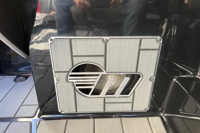 Slide: The Image of 2021 Malibu Wakesetter 23 MXZ boat detail with sleek metal design. - 27