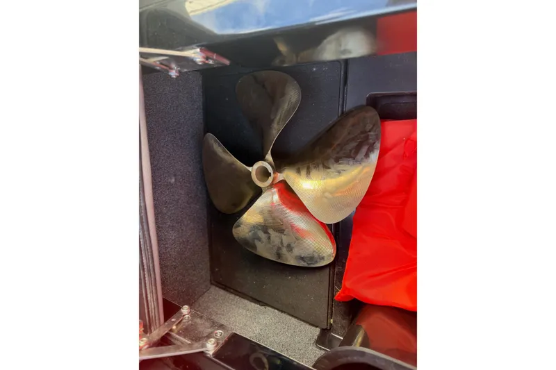 Slide: The Image of Propeller of 2021 Malibu Wakesetter 23 MXZ boat, stored in compartment. - 29