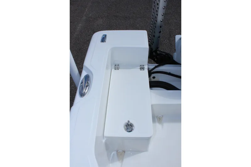 Slide: The Image of 2024 Clearwater 1900 CC boat storage compartment with sleek white finish. - 12