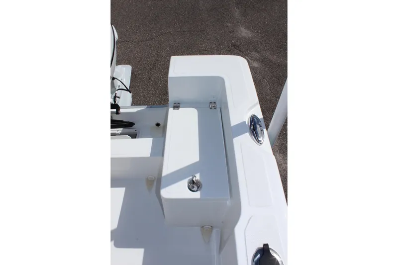 Slide: The Image of 2024 Clearwater 1900 CC boat deck with storage compartment and chrome fixtures. - 10