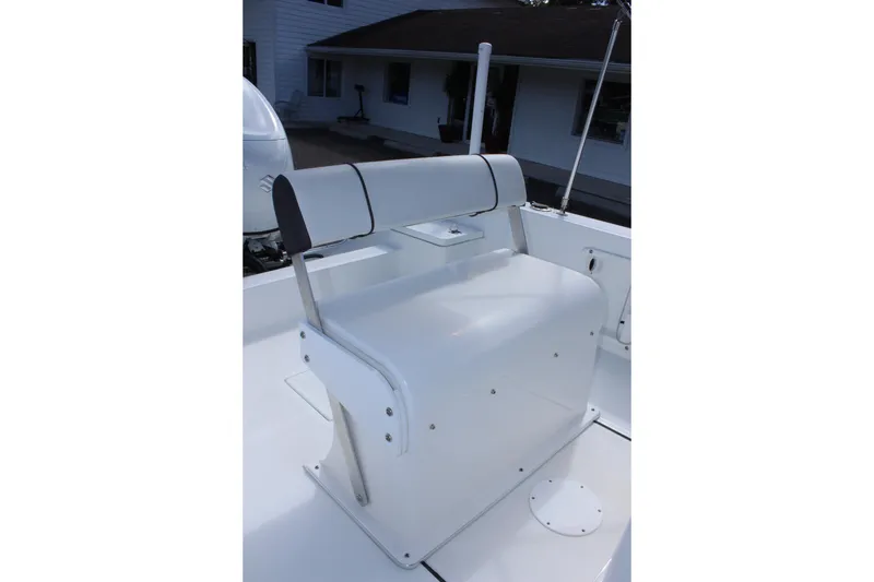 Slide: The Image of 2024 Clearwater 1900 CC boat seat with white and black design. - 17