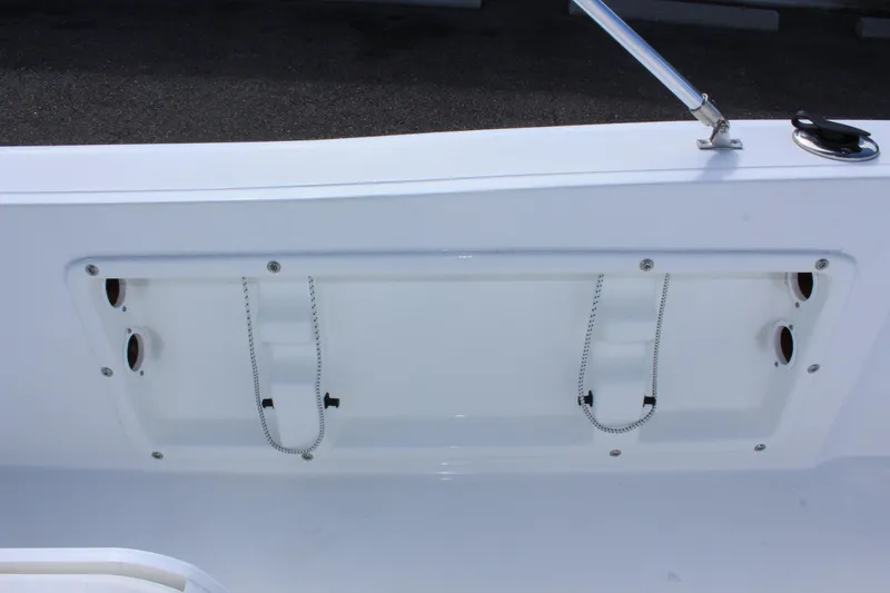 Slide: The Image of 2024 Clearwater 1900 CC boat interior detail with storage compartment. - 19