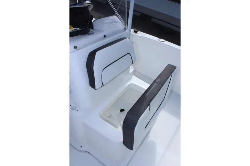 Slide: The Image of 2024 Clearwater 1900 CC boat interior seating and storage compartment. - 21