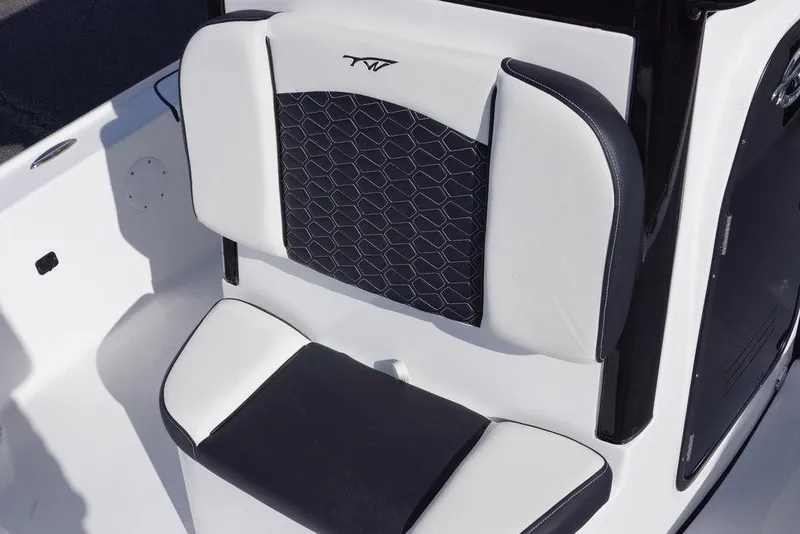 Slide: The Image of 2026 Tidewater 2410 Bay Max boat seat with black and white upholstery design. - 10
