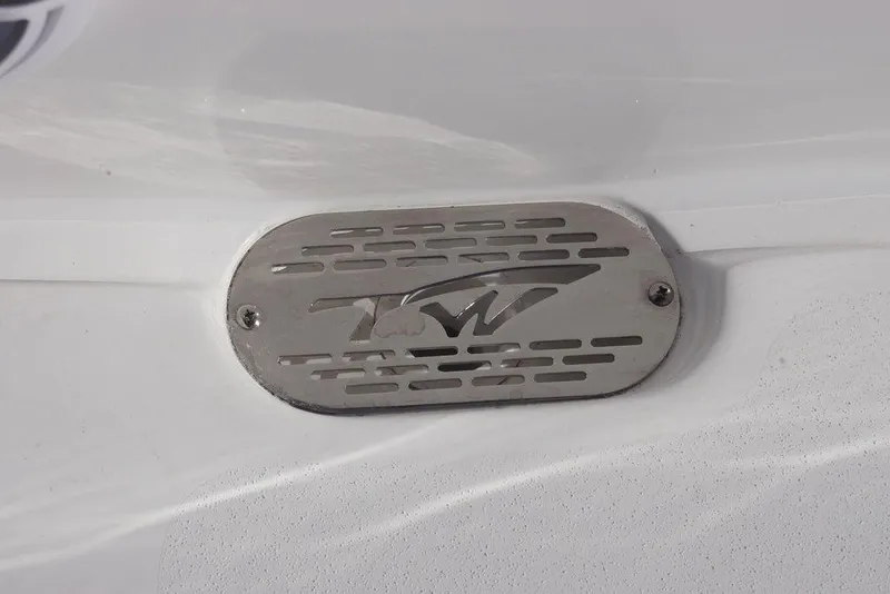 Slide: The Image of Tidewater 2410 Bay Max 2026 boat detail with metal vent cover. - 23