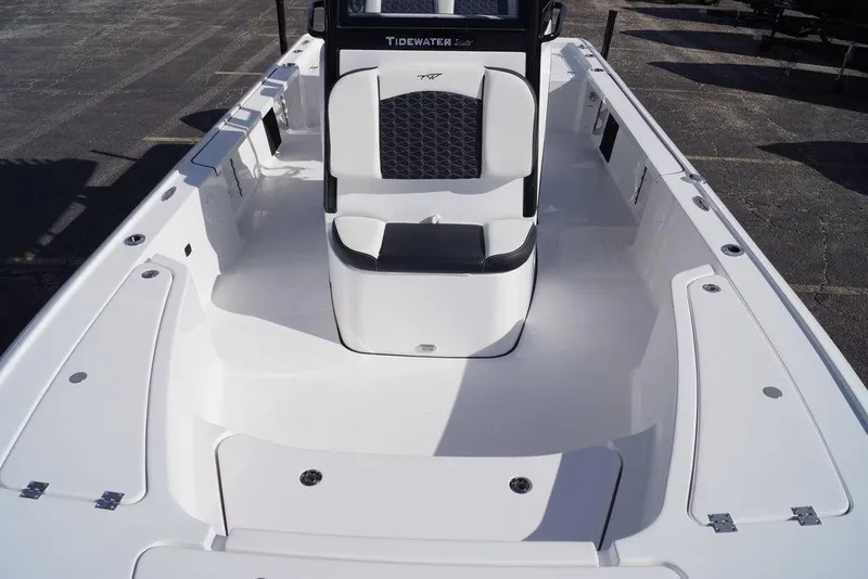 Slide: The Image of 2026 Tidewater 2410 Bay Max boat interior with seating and storage compartments. - 8