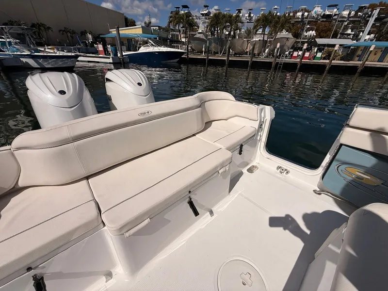 Slide: The Image of Interior of a 2020 Sea Hunt Ultra 265 SE boat at the marina. - 14