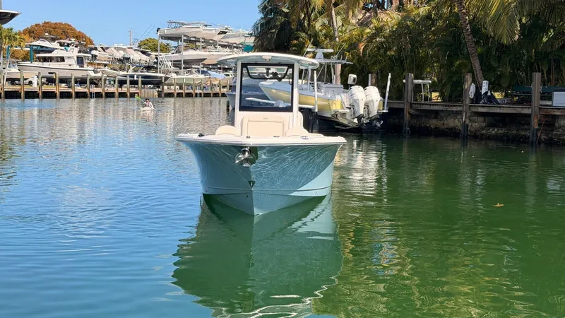 Slide: The Image of Sea Hunt Ultra 265 SE 2020 in a calm harbor. - 2